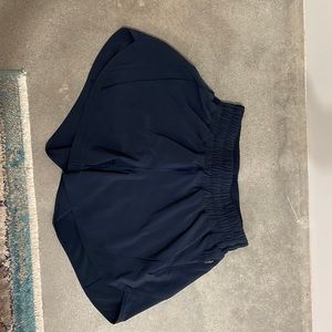 Lululemon Track That Mid-Rise Lined Short. Navy blue with black lining.